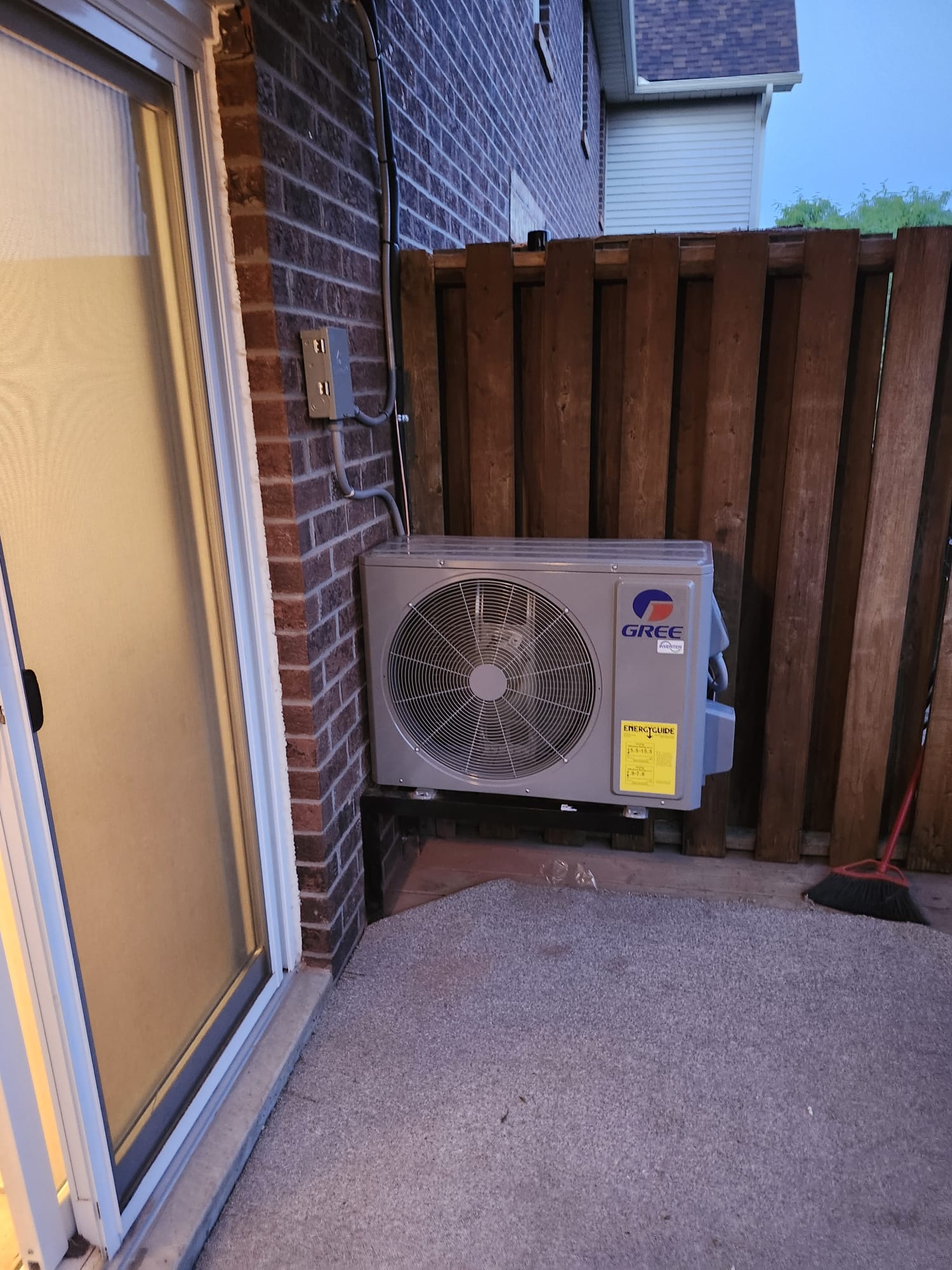 GREE ductless mini-split heat pump installed on a patio
